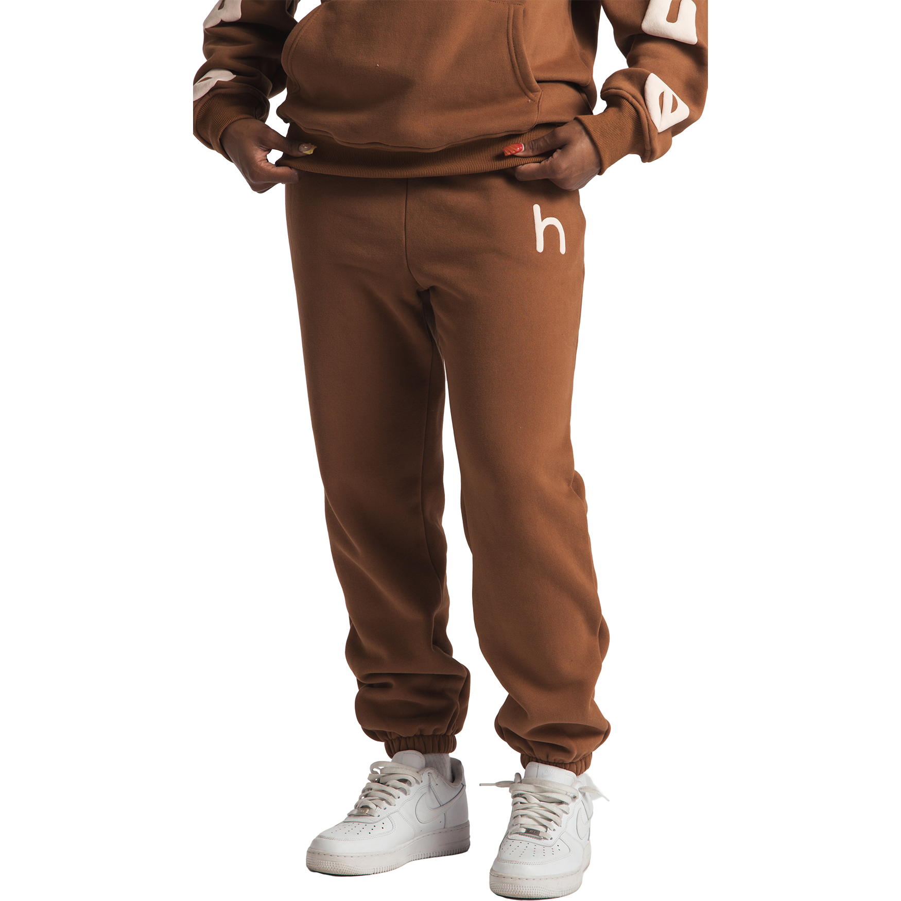 woman wearing brown huupe sweats