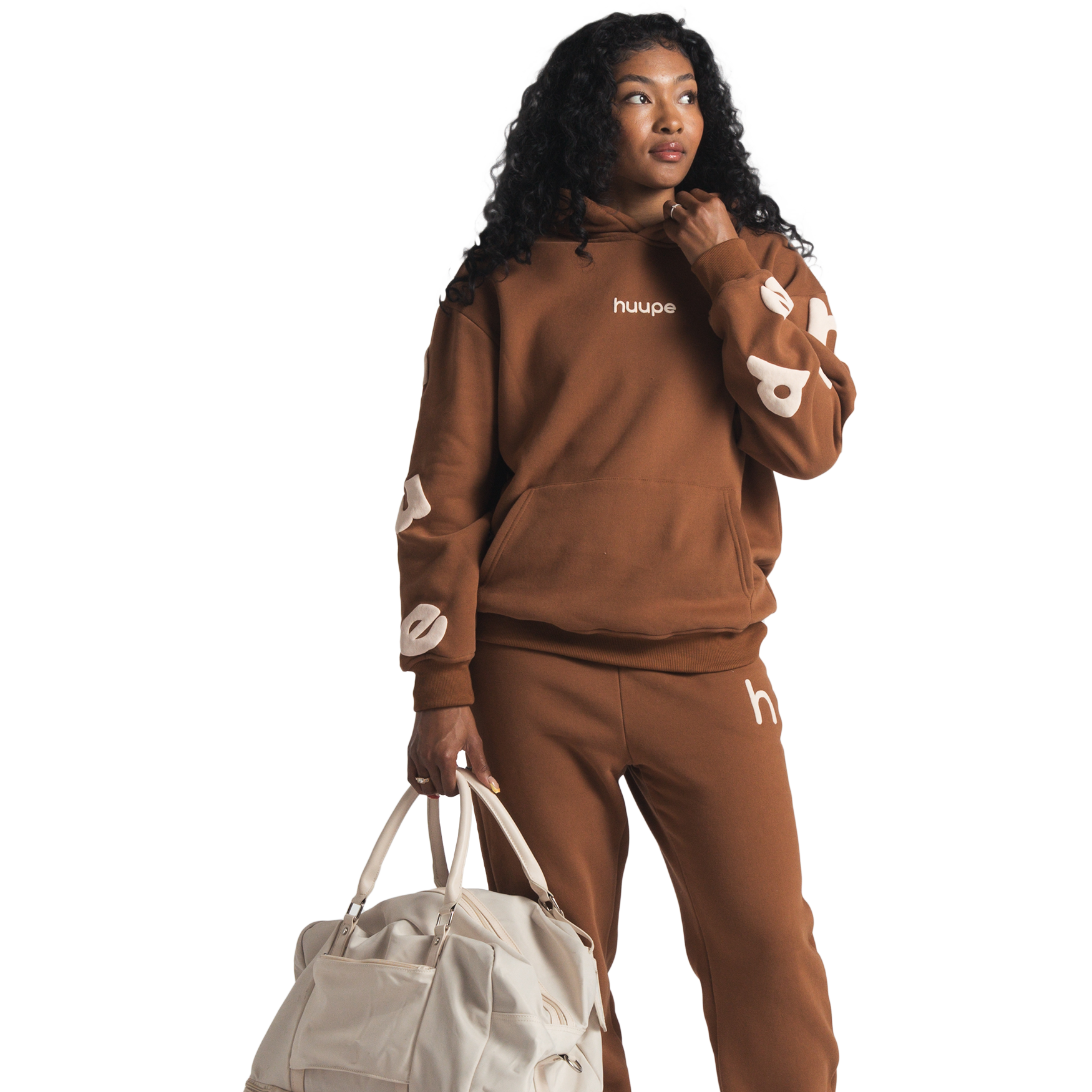 woman wearing brown huupe sweats