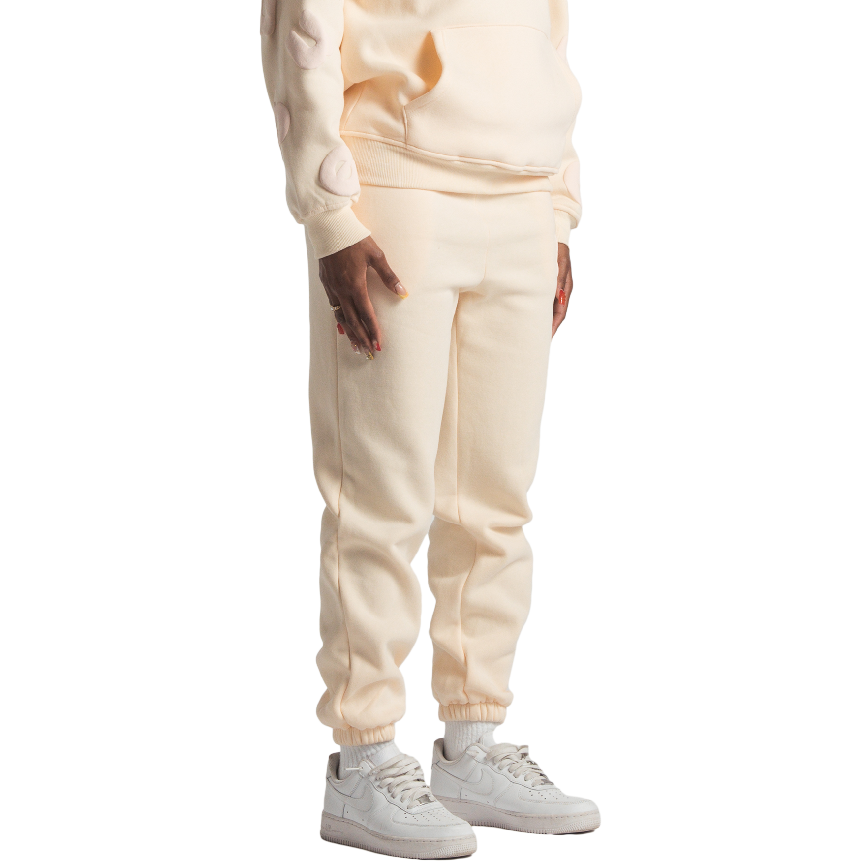 woman wearing cream huupe sweats